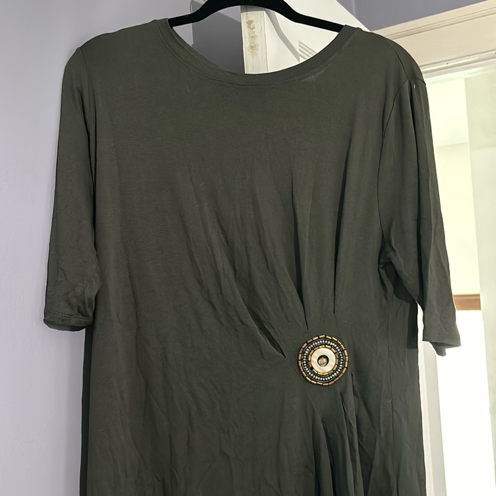 Green blouse with embellishment